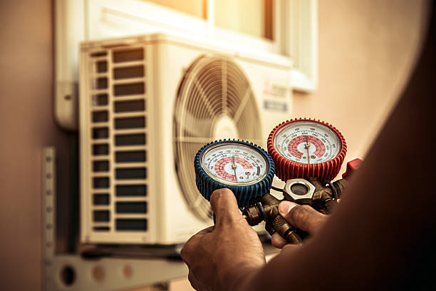 Professional Air Conditioning Service technician working in Queen Creek, AZ